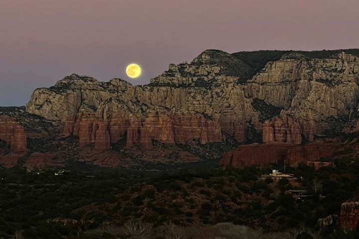 a canyon with a sunset in the background